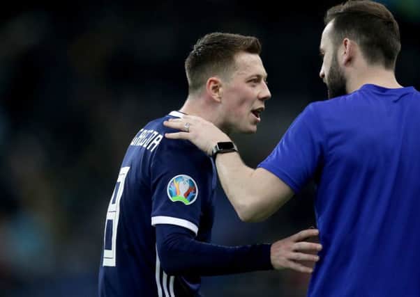 Scotland's Callum McGregor (left) exchanges words with assistant coach James McFadden after the UEFA Euro 2020 Qualifying, Group I match at the Astana Arena. PRESS ASSOCIATION Photo. Picture date: Thursday March 21, 2019. See PA story SOCCER Kazakhstan. Photo credit should read: Adam Davy/PA Wire. RESTRICTIONS: Use subject to restrictions. Editorial use only. Commercial use only with prior written consent of the Scottish FA.