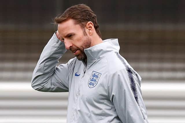 Thinking time for Gareth Southgate as he contemplates his team to face Czech Republic during training at St Georges Park yesterday. Picture: PA.