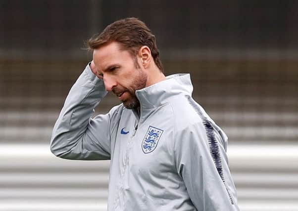 Thinking time for Gareth Southgate as he contemplates his team to face Czech Republic during training at St Georges Park yesterday. Picture: PA.