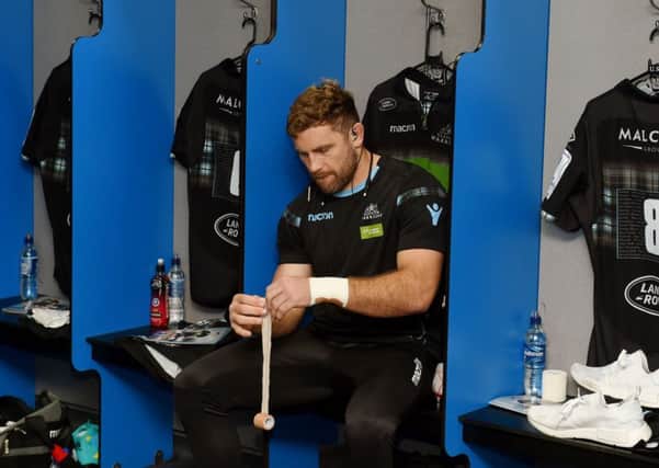 Glasgow Warriors' Callum Gibbins in reflective mood in the dressing room. Picture: Paul Devlin/SNS