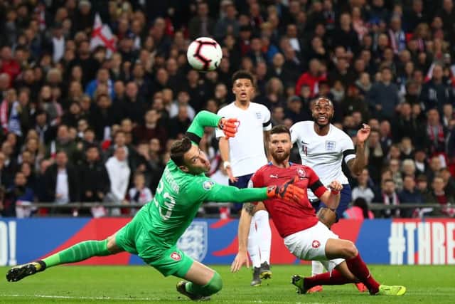 Raheem Sterling curls the ball past Czech Republic keeper Jiri Pavlenka for Englands third goal. Picture: Getty