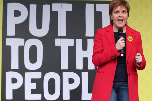 First Minister of Scotland Nicola Sturgeon addresses anti-Brexit campaigners in Parliament Square as they take part in the People's Vote March in London. Pic: Yui Mok/PA Wire