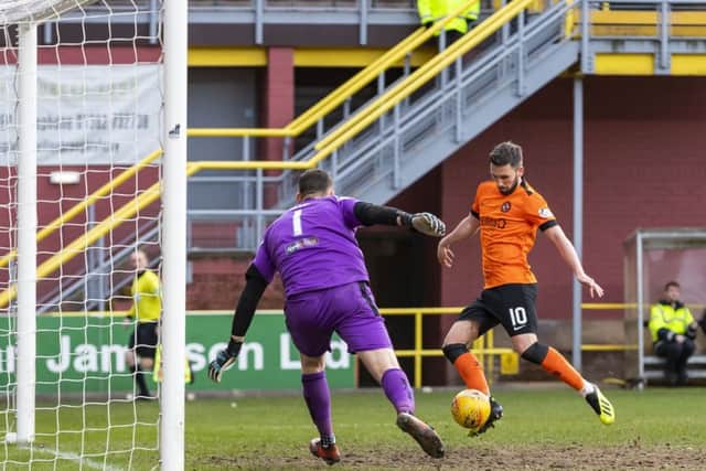 Nicky Clark scores
Dundee United's late winner. Picture: Roddy Scott/SNS
