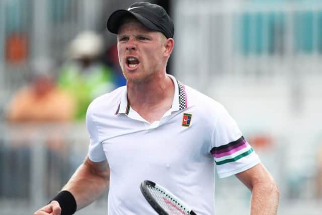 Kyle Edmund roars with delight after defeating Milos Raonic of Canada in straight sets. Picture: Julian Finney/Getty Images