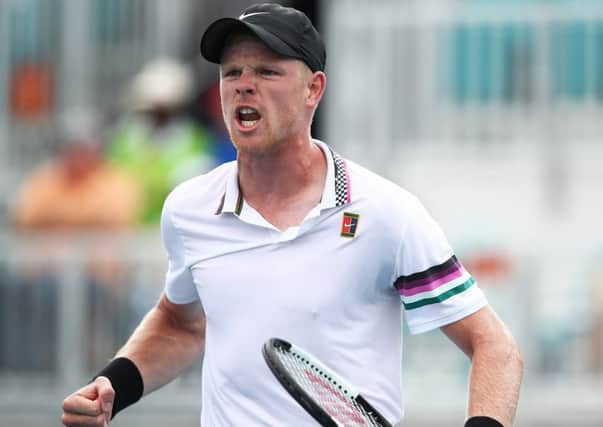 Kyle Edmund roars with delight after defeating Milos Raonic of Canada in straight sets. Picture: Julian Finney/Getty Images