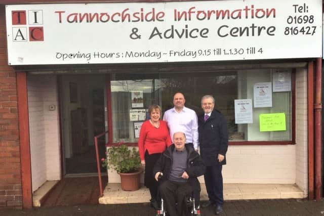 Tannochside Information and Advice Centre staff and management committee members with Thorniewood councillor Bob Burrows