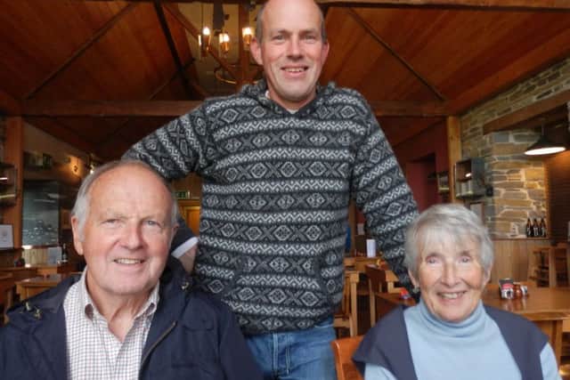 Magnus Spence (centre) with his late mother Sheila Spence and father Albert Spence. Pic: SWNS