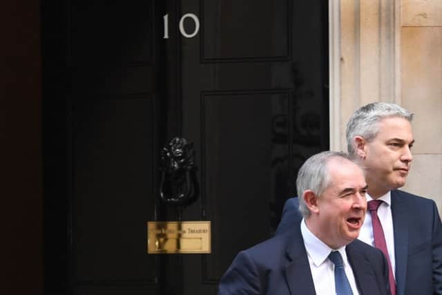 Brexit Secretary Stephen Barclay (right) and Attorney General Geoffrey Cox leave 10 Downing Street. Picture: Stefan Rousseau/PA Wire