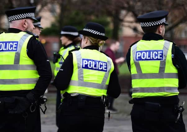 Police Scotland officers. Picture: John Devlin