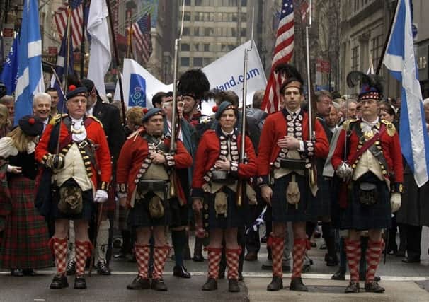 Pipers march up 6th Avenue in New York to celebrate Tartan Day which will be held again this year on April 6 to mark the historic links between Scotland and the United States. Photo by Mark Mainz/Getty Images)