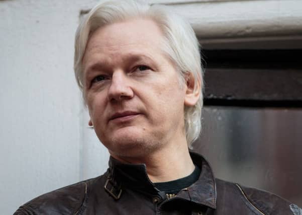 Julian Assange speaks to the media from the balcony of the Embassy Of Ecuador in London. Picture: Jack Taylor/Getty Images