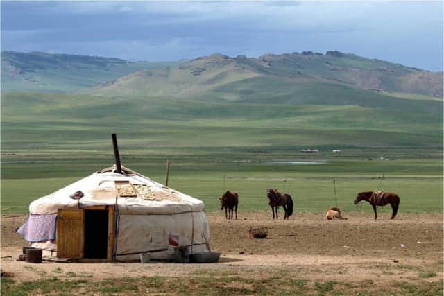 Famed for idyllic settings of blue skies surmounting panoramic vistas, dotted with round, white gers and quietly grazing livestock, Mongolias nomads appear to present glimpses of simple bygone lifestyles caught in a time warp.