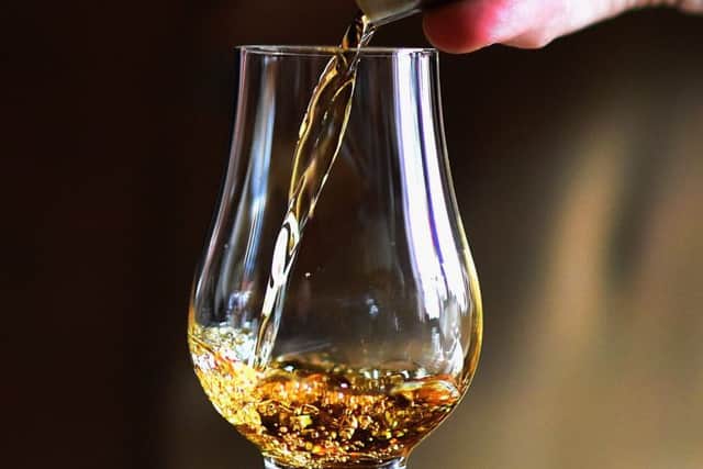 A whisky being poured at the Scotch Whisky Experience. Picture: Jeff J Mitchell/Getty Images