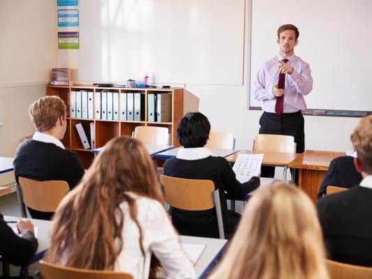 Percentage of school leavers in a work, training, or further education: 100 per cent