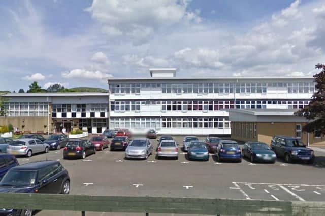 Percentage of school leavers in a work, training, or further education: 100 per cent