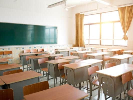 Percentage of school leavers in a work, training, or further education: 100 per cent