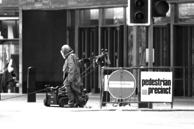 Glasgow crowds and shoppers stood well back when a suspect package was discovered in a litter bin outside Marks & Spencer store in Argyle Street, July 1985.