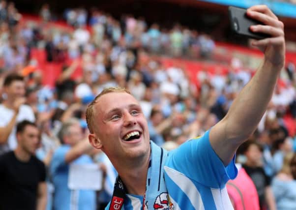 Jack Grimmer celebrates winning promotion to League One with Coventry. Picture: Getty Images