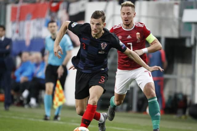 Borna Barisic was injured playing for Croatia. Picture: Laszlo Szirtesi/Getty Images