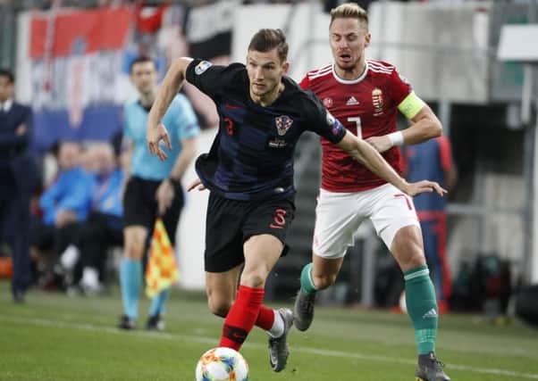 Borna Barisic was injured playing for Croatia. Picture: Laszlo Szirtesi/Getty Images