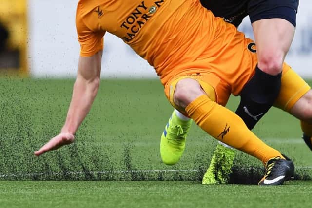 Livingston's  plastic pitch at the Tony Macaroni Arena.