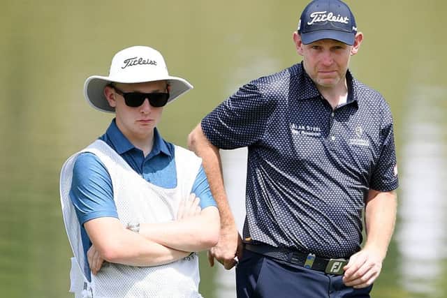 Stephen Gallacher and his caddie, son Jack, during the opening round of the Hero Indian Open in New Delhi, Picture: Getty Images