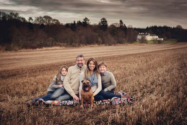 Tim and Stef Erbe with children Alex and Amy and their dog, Ginger, at the Logie Country House estate. Picture: Susan Renée at Kingshill Studios