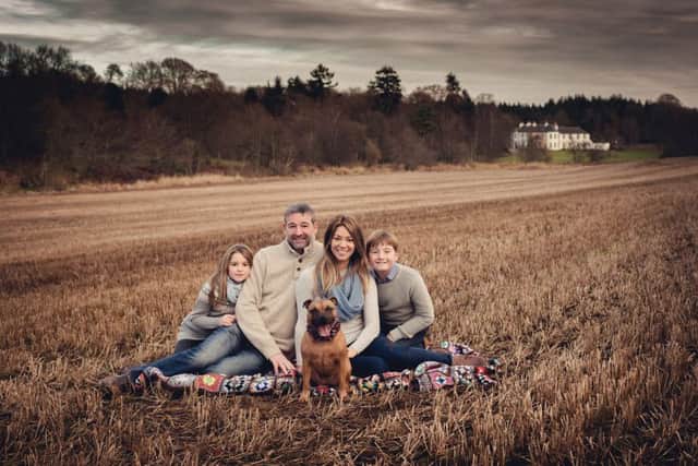 Tim and Stef Erbe with children Alex and Amy and their dog, Ginger, at the Logie Country House estate. Picture: Susan Renée at Kingshill Studios