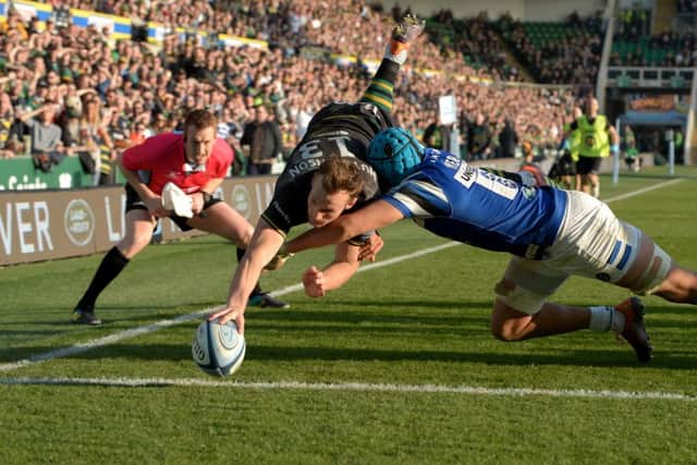 Rory Hutchinson of Northampton Saints dives in to score against Bath. Picture: Getty
