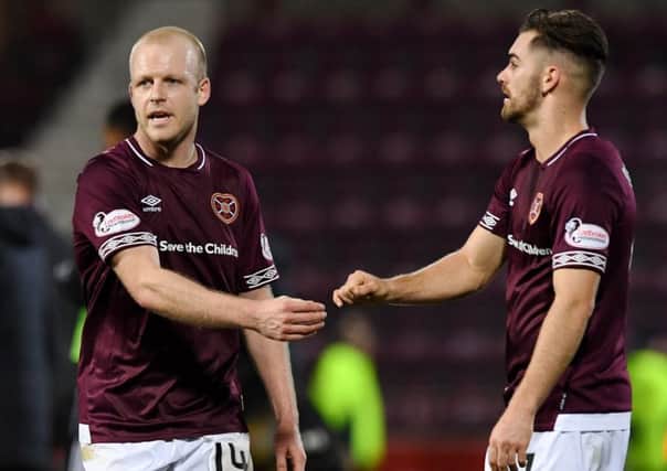 Hearts hope Steven Naismith, left, with sign a new deal but Ben Garuccio, right, is out for 10 month. Picture: SNS