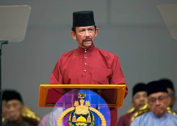Bruneis Sultan Hassanal Bolkiah has introduced laws that could see gay people stoned to death (Picture: AFP/Getty)