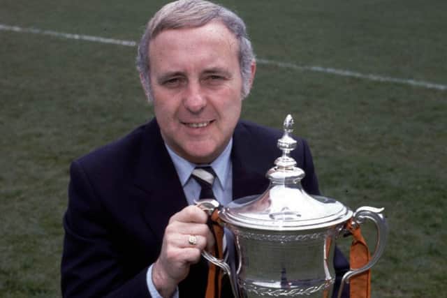 Jim McLean sits proudly with the Premier Division trophy in 1983. Picture: SNS