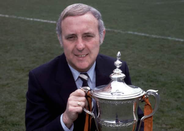 Jim McLean sits proudly with the Premier Division trophy in 1983. Picture: SNS