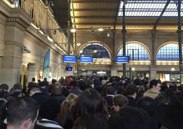 People queued at the Eurostar terminal at the Gare du Nord train station in Paris. Picture: AP Photo/Tony Hicks