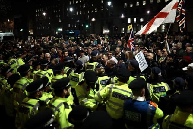 Angry pro-Brexit demonstrators outside parliament on Friday give a foretaste of the likely response were Article 50 to be revoked. Picture: Dan Kitwood/Getty