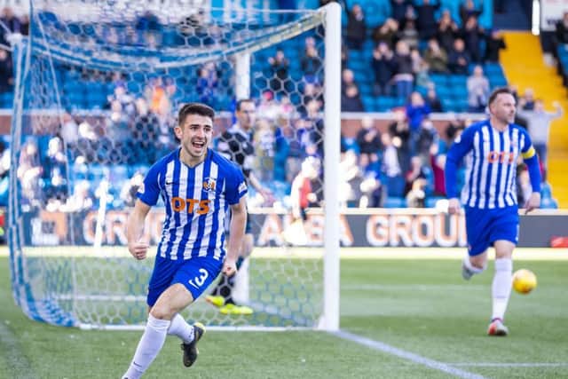 Greg Taylor celebrates after opening the scoring. Picture: SNS