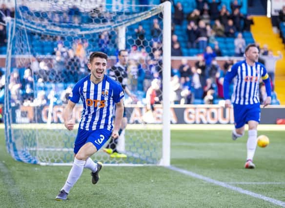 Greg Taylor celebrates after opening the scoring. Picture: SNS