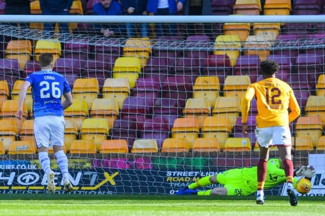 Motherwell goalkeeper Mark Gillespie saves Liam Craig's first-half penalty. Picture: SNS