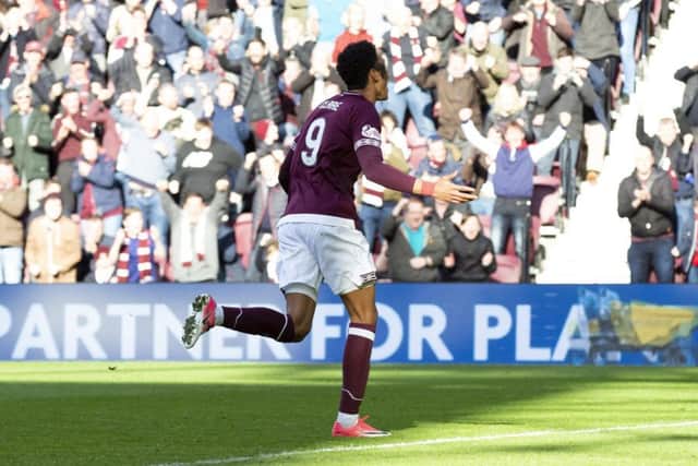 Sean Clare turns away to celebrate his goal to make it 1-1. Picture: SNS