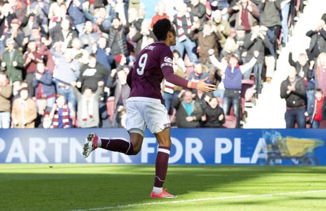 Sean Clare turns away to celebrate his goal to make it 1-1. Picture: SNS