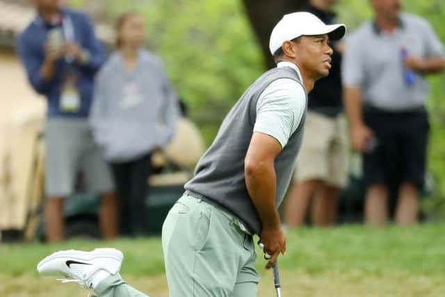 Tiger Woods plays his second shot on the eighth hole in his match against Rory McIlroy. Picture: Warren Little/Getty Images