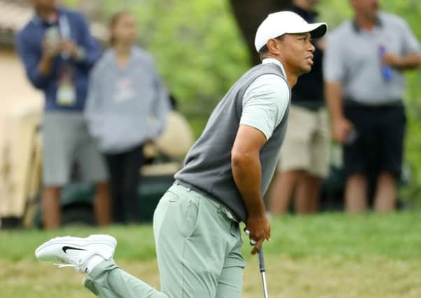 Tiger Woods plays his second shot on the eighth hole in his match against Rory McIlroy. Picture: Warren Little/Getty Images