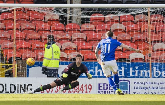 Stephen Dobbie sends Benjamin Siegrist in the United goal the wrong way from the penalty spot. Photograph: Kenny Smith/SNS