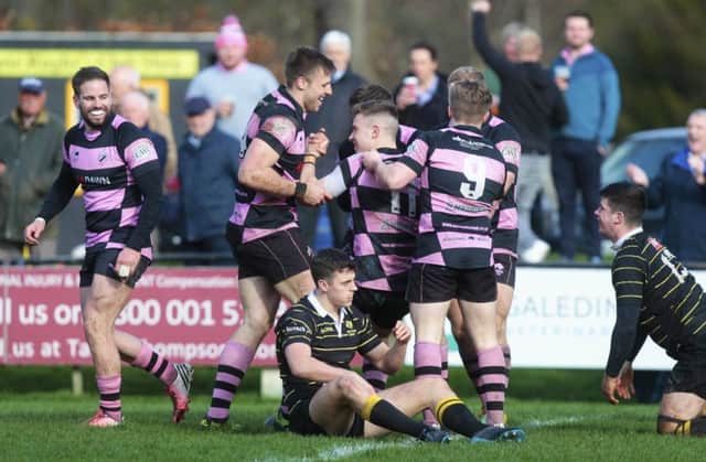 The Ayr team celebrate Kyle Rowe's try. Picture: SNS