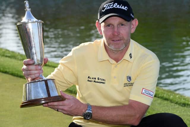 Stephen Gallacher shows off the trophy after his win in the Hero Indian Open in New Delhi. Picture: Getty Images
