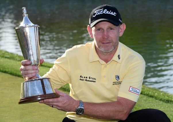 Stephen Gallacher shows off the trophy after his win in the Hero Indian Open in New Delhi. Picture: Getty Images