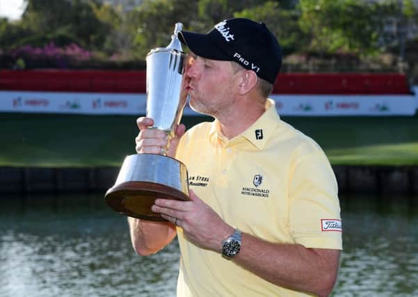 Stephen Gallacher kisses the trophy following his victory in the Hero Indian Open. Picture: Getty