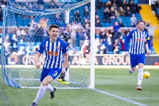Greg Taylor wheels away to celebrate scoring Kilmarnocks second goal. Picture: SNS.