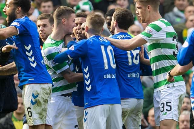Celtic and Rangers players were involved in a bust up at the end of the last Old Firm encounter. Picture: SNS