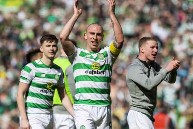 Celtic's Scott Brown applauds the fans at full time. Picture: SNS